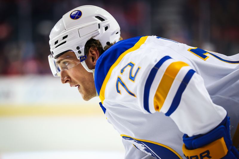 Jan 23, 2025; Calgary, Alberta, CAN; Buffalo Sabres center Tage Thompson (72) during the face off against the Calgary Flames during the first period at Scotiabank Saddledome. Mandatory Credit: Sergei Belski-Imagn Images