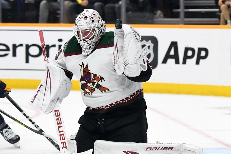 Nov 11, 2023; Nashville, Tennessee, USA; Arizona Coyotes goaltender Connor Ingram (39) makes a save during the third period against the Nashville Predators at Bridgestone Arena. Mandatory Credit: Christopher Hanewinckel-USA TODAY Sports