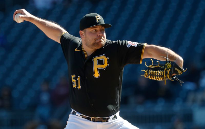 Apr 9, 2023; Pittsburgh, Pennsylvania, USA;  Pittsburgh Pirates relief pitcher David Bednar (51) pitches against the Chicago White Sox during the ninth inning at PNC Park. The Pirates shutout Chicago 1-0. Mandatory Credit: Charles LeClaire-USA TODAY Sports