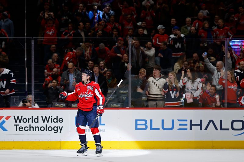 Jan 14, 2025; Washington, District of Columbia, USA; Washington Capitals defenseman John Carlson (74) celebrates after scoring a goal against the Anaheim Ducks in the first period at Capital One Arena. Mandatory Credit: Geoff Burke-Imagn Images