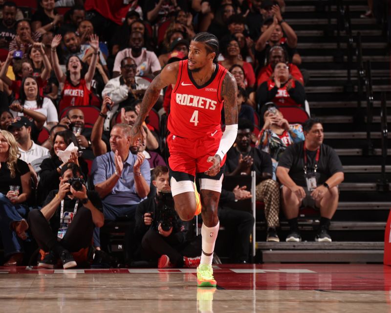 HOUSTON, TX - NOVEMBER 11: Jalen Green #4 of the Houston Rockets celebrates during the game against the Washington Wizards on November 11, 2024 at the Toyota Center in Houston, Texas. NOTE TO USER: User expressly acknowledges and agrees that, by downloading and or using this photograph, User is consenting to the terms and conditions of the Getty Images License Agreement. Mandatory Copyright Notice: Copyright 2024 NBAE (Photo by KeShawn Ennis/NBAE via Getty Images)