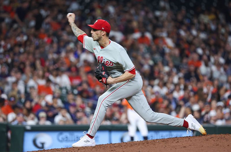 Apr 30, 2023; Houston, Texas, USA; Philadelphia Phillies relief pitcher Connor Brogdon (75) delivers a pitch during the sixth inning against the Houston Astros at Minute Maid Park. Mandatory Credit: Troy Taormina-USA TODAY Sports