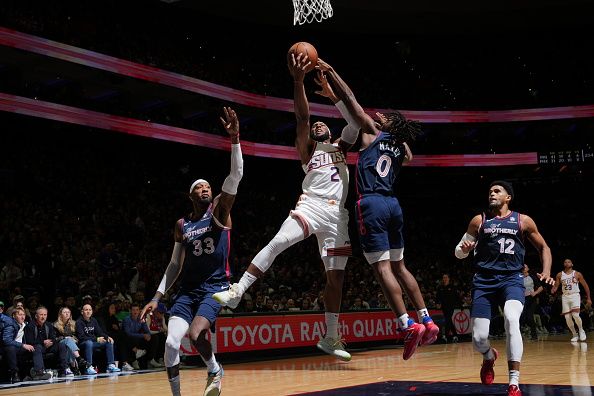 PHILADELPHIA, PA - NOVEMBER 4: Josh Okogie #2 of the Phoenix Suns drives to the basket during the game against the Philadelphia 76ers on November 4, 2023 at the Wells Fargo Center in Philadelphia, Pennsylvania NOTE TO USER: User expressly acknowledges and agrees that, by downloading and/or using this Photograph, user is consenting to the terms and conditions of the Getty Images License Agreement. Mandatory Copyright Notice: Copyright 2023 NBAE (Photo by Jesse D. Garrabrant/NBAE via Getty Images)