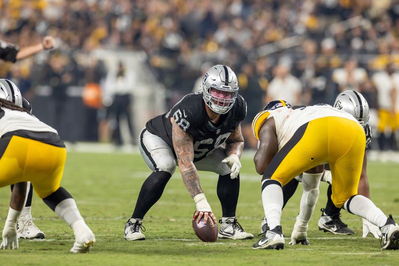 Las Vegas Raiders center Andre James (68) lines up against the Pittsburgh Steelers in an NFL football game, Sunday, Sept. 24, 2023, in Las Vegas, NV. Steelers won 23-18. (AP Photo/Jeff Lewis)