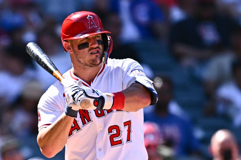 Aug 24, 2025; Anaheim, California, USA; Los Angeles Angels designated hitter Mike Trout (27) at bat against the Chicago Cubs during the eighth inning at Angel Stadium. Mandatory Credit: Jonathan Hui-Imagn Images