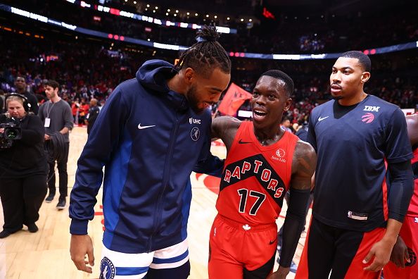 TORONTO, CANADA - OCTOBER 25: Leonard Miller #33 of the Minnesota Timberwolves and Dennis Schroder #17 of the Toronto Raptors laugh after the game on October 25, 2023 at the Scotiabank Arena in Toronto, Ontario, Canada.  NOTE TO USER: User expressly acknowledges and agrees that, by downloading and or using this Photograph, user is consenting to the terms and conditions of the Getty Images License Agreement.  Mandatory Copyright Notice: Copyright 2023 NBAE (Photo by Vaughn Ridley/NBAE via Getty Images)