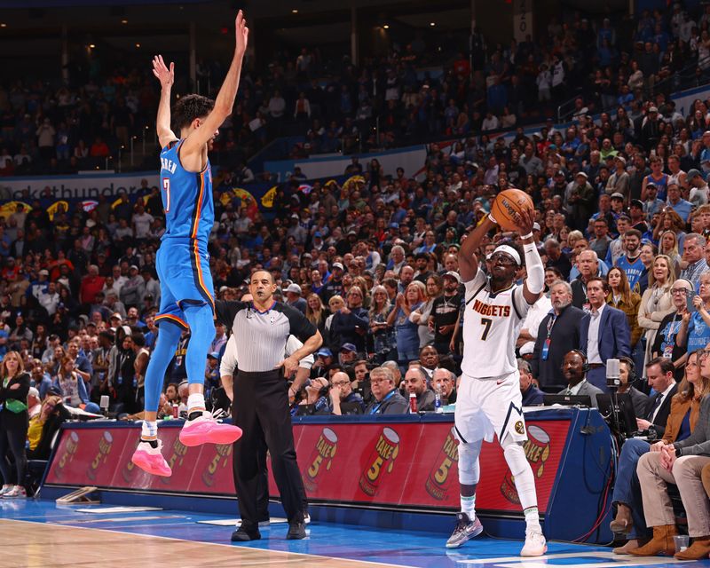 OKLAHOMA CITY, OK - JANUARY 31: Reggie Jackson #7 of the Denver Nuggets passes the ball during the game against the Oklahoma City Thunder on January 31, 2024 at Paycom Arena in Oklahoma City, Oklahoma. NOTE TO USER: User expressly acknowledges and agrees that, by downloading and or using this photograph, User is consenting to the terms and conditions of the Getty Images License Agreement. Mandatory Copyright Notice: Copyright 2024 NBAE (Photo by Zach Beeker/NBAE via Getty Images)