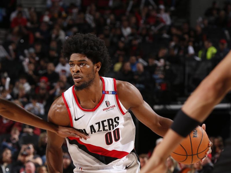 PORTLAND, OR - OCTOBER 18: Scoot Henderson #00 of the Portland Trail Blazers dribbles the ball during the game against the Utah Jazz on October 18, 2024 at the Moda Center Arena in Portland, Oregon. NOTE TO USER: User expressly acknowledges and agrees that, by downloading and or using this photograph, user is consenting to the terms and conditions of the Getty Images License Agreement. Mandatory Copyright Notice: Copyright 2024 NBAE (Photo by Cameron Browne/NBAE via Getty Images)