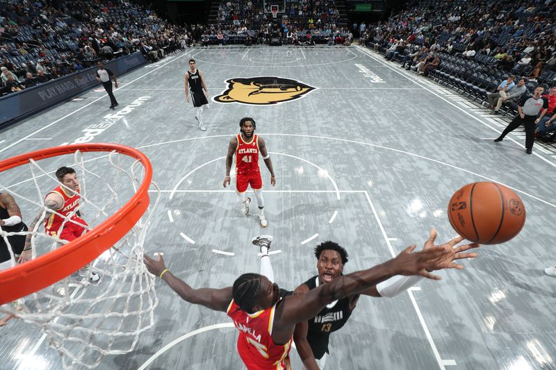 MEMPHIS, TN - MARCH 8: Jaren Jackson Jr. #13 of the Memphis Grizzlies drives to the basket during the game against the Atlanta Hawks on March 8, 2024 at FedExForum in Memphis, Tennessee. NOTE TO USER: User expressly acknowledges and agrees that, by downloading and or using this photograph, User is consenting to the terms and conditions of the Getty Images License Agreement. Mandatory Copyright Notice: Copyright 2024 NBAE (Photo by Joe Murphy/NBAE via Getty Images)