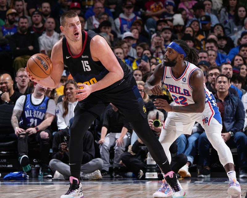 DENVER, CO - JANUARY 27: Nikola Jokic #15 of the Denver Nuggets looks to pass the ball during the game against the Philadelphia 76ers on January 27, 2024 at the Ball Arena in Denver, Colorado. NOTE TO USER: User expressly acknowledges and agrees that, by downloading and/or using this Photograph, user is consenting to the terms and conditions of the Getty Images License Agreement. Mandatory Copyright Notice: Copyright 2024 NBAE (Photo by Garrett Ellwood/NBAE via Getty Images)