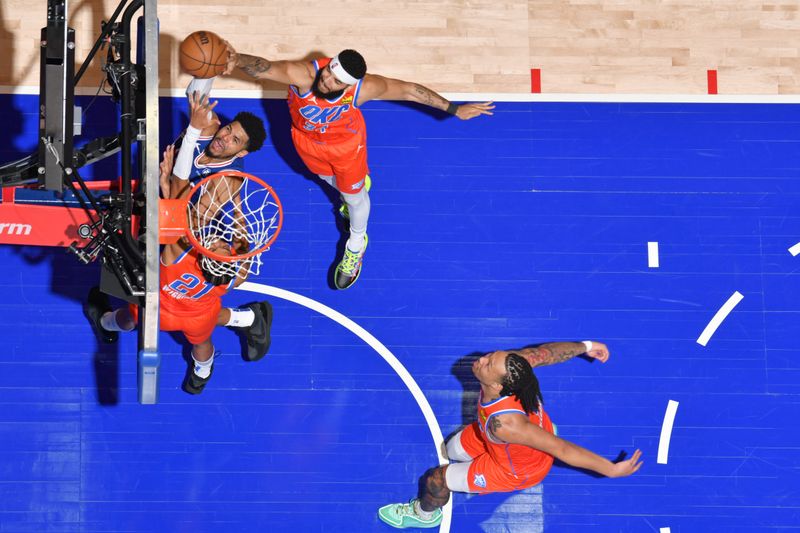 PHILADELPHIA, PA - APRIL 2: Kenrich Williams #34 of the Oklahoma City Thunder blocks Tobias Harris #12 of the Philadelphia 76ers during the game on April 2, 2024 at the Wells Fargo Center in Philadelphia, Pennsylvania NOTE TO USER: User expressly acknowledges and agrees that, by downloading and/or using this Photograph, user is consenting to the terms and conditions of the Getty Images License Agreement. Mandatory Copyright Notice: Copyright 2024 NBAE (Photo by Jesse D. Garrabrant/NBAE via Getty Images)