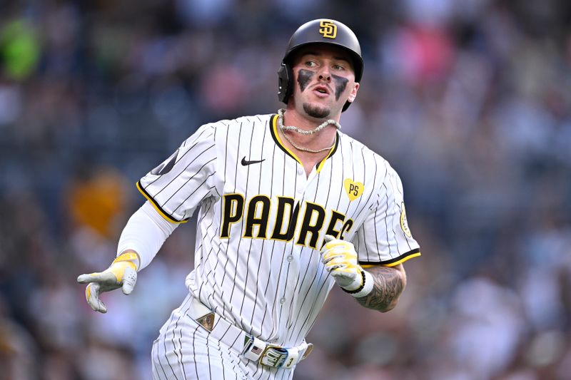 Aug 21, 2024; San Diego, California, USA; San Diego Padres center fielder Jackson Merrill (3) rounds the bases after hitting a two-run home run against the Minnesota Twins during the eighth inning at Petco Park. Mandatory Credit: Orlando Ramirez-USA TODAY Sports