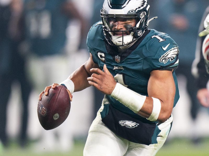 Philadelphia Eagles quarterback Jalen Hurts (1) in action during the NFL football game against the San Francisco 49ers, Sunday, Dec. 3, 2023, in Philadelphia. (AP Photo/Chris Szagola)