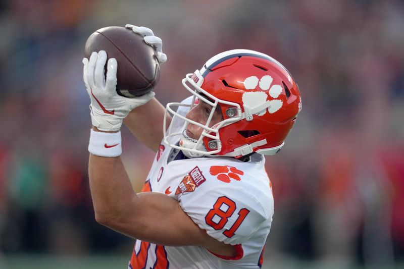 Dec 29, 2021; Orlando, Florida, USA; Clemson Tigers wide receiver Drew Swinney (81) catches a ball during warmups before their game against the Iowa State Cyclones in the 2021 Cheez-It Bowl at Camping World Stadium. Mandatory Credit: Jasen Vinlove-USA TODAY Sports