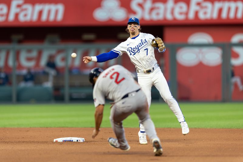 Aug 6, 2024; Kansas City, Missouri, USA; Kansas City Royals shortstop Bobby Witt Jr. (7) throws over Boston Red Sox first base Dominic Smith (2) during the fourth inning at Kauffman Stadium. Mandatory Credit: William Purnell-USA TODAY Sports