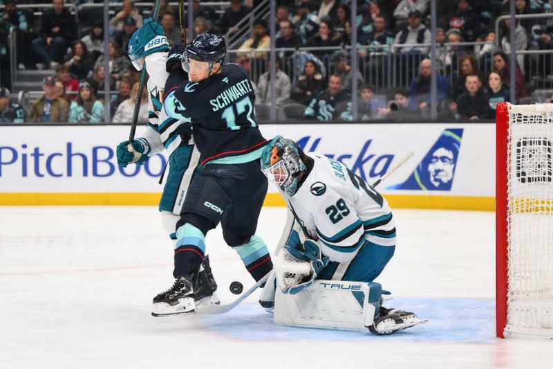 Nov 30, 2024; Seattle, Washington, USA; San Jose Sharks goaltender Mackenzie Blackwood (29) blocks a Seattle Kraken goal shot during the second period at Climate Pledge Arena. Mandatory Credit: Steven Bisig-Imagn Images