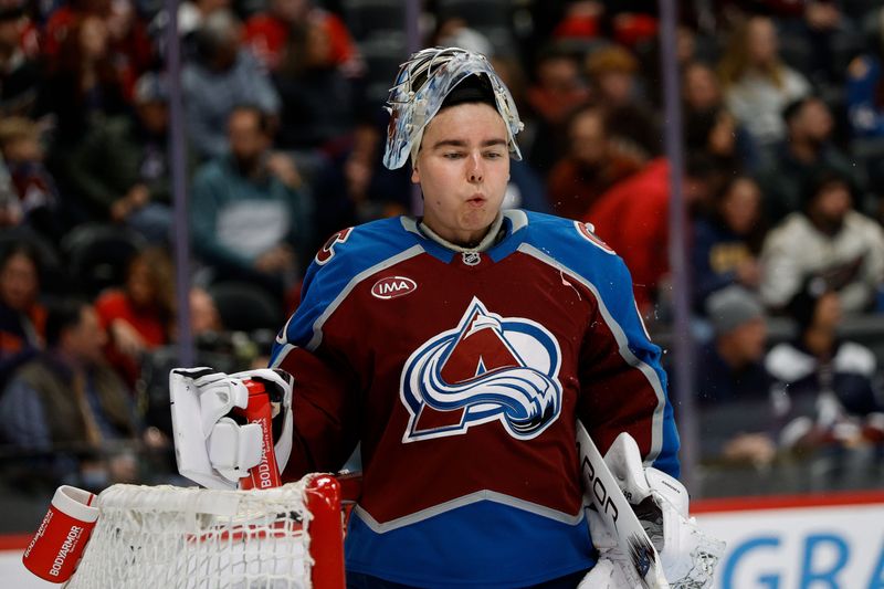 Nov 15, 2024; Denver, Colorado, USA; Colorado Avalanche goaltender Justus Annunen (60) in the first period against the Washington Capitals at Ball Arena. Mandatory Credit: Isaiah J. Downing-Imagn Images