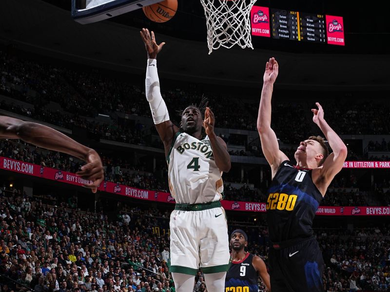 DENVER, CO - MARCH 7: Jrue Holiday #4 of the Boston Celtics drives to the basket during the game against the Denver Nuggets on March 7, 2024 at the Ball Arena in Denver, Colorado. NOTE TO USER: User expressly acknowledges and agrees that, by downloading and/or using this Photograph, user is consenting to the terms and conditions of the Getty Images License Agreement. Mandatory Copyright Notice: Copyright 2024 NBAE (Photo by Garrett Ellwood/NBAE via Getty Images)