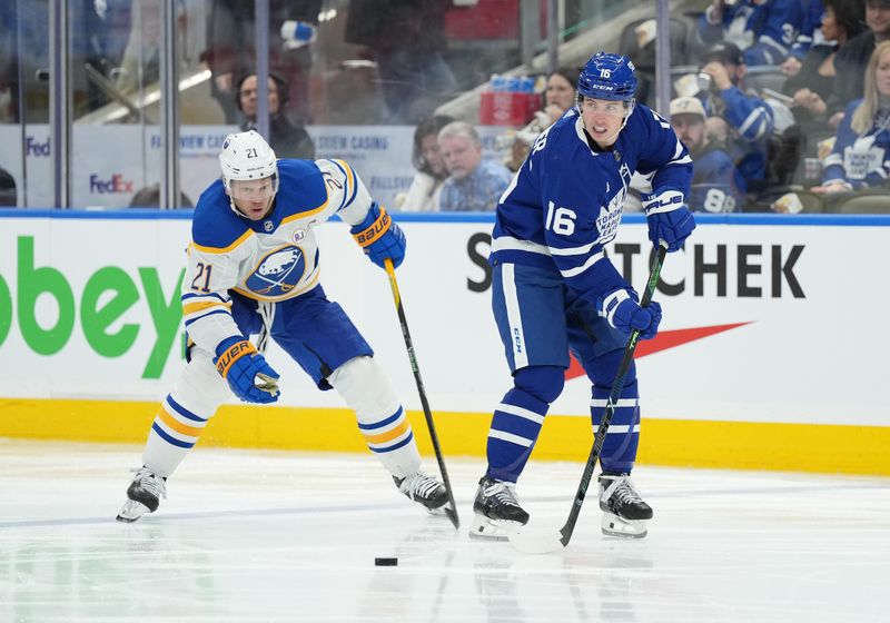 Mar 6, 2024; Toronto, Ontario, CAN; Toronto Maple Leafs right wing Mitchell Marner (16) battles for the puck with Buffalo Sabres right wing Kyle Okposo (21) during the third period at Scotiabank Arena. Mandatory Credit: Nick Turchiaro-USA TODAY Sports