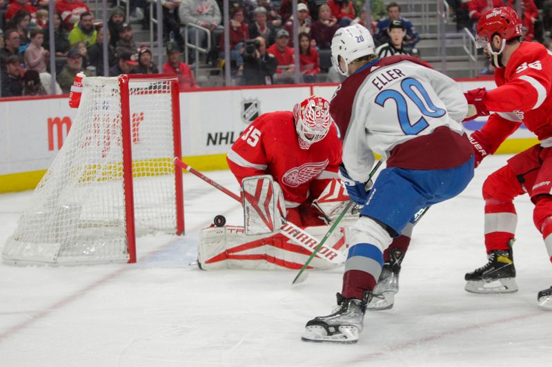 Mar 18, 2023; Detroit, Michigan, USA; Colorado Avalanche center Lars Eller (20) takes a shot on Detroit Red Wings goaltender Ville Husso (35) at Little Caesars Arena. Mandatory Credit: Brian Bradshaw Sevald-USA TODAY Sports