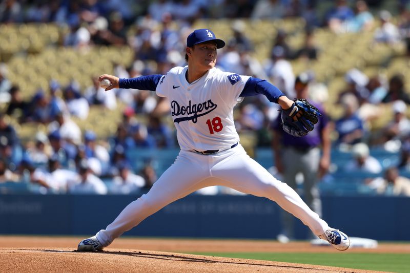 Sep 22, 2024; Los Angeles, California, USA;  Los Angeles Dodgers starting pitcher Yoshinobu Yamamoto (18) pitches during the first inning against the Colorado Rockies at Dodger Stadium. Mandatory Credit: Kiyoshi Mio-Imagn Images