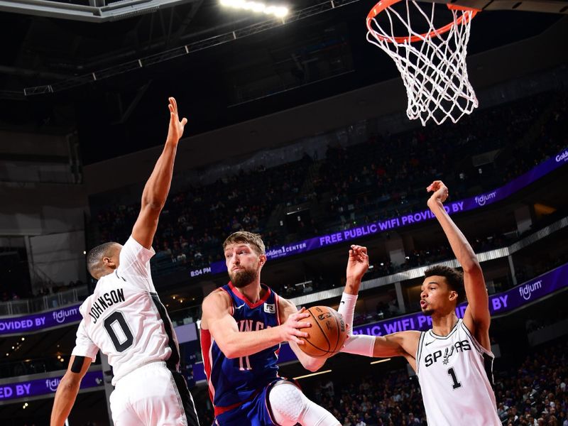 SACRAMENTO, CA - DECEMBER 1: Domantas Sabonis #11 of the Sacramento Kings handles the ball during the game against the San Antonio Spurs on December 1, 2024 at Golden 1 Center in Sacramento, California. NOTE TO USER: User expressly acknowledges and agrees that, by downloading and or using this Photograph, user is consenting to the terms and conditions of the Getty Images License Agreement. Mandatory Copyright Notice: Copyright 2024 NBAE (Photo by Adam Pantozzi/NBAE via Getty Images)