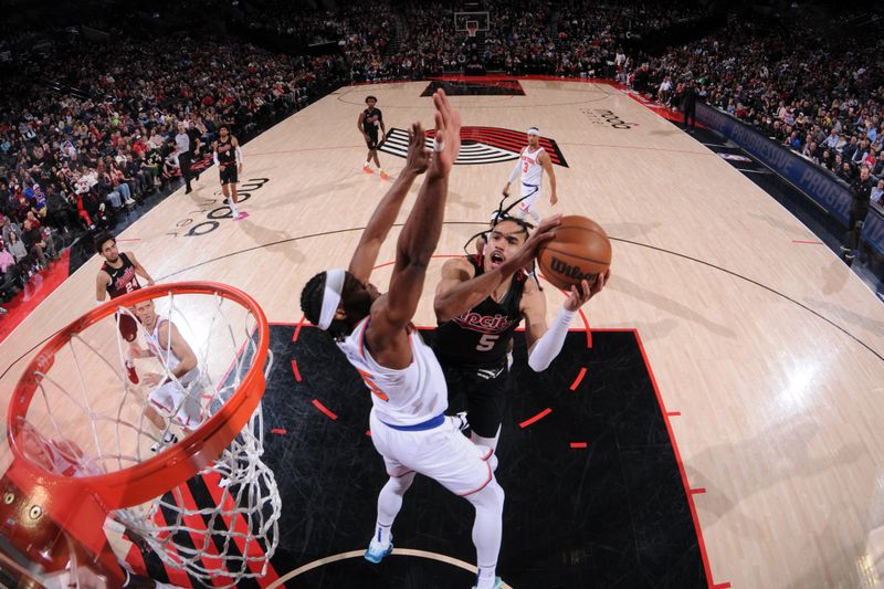 PORTLAND, OR - MARCH 14: Dalano Banton #5 of the Portland Trail Blazers drives to the basket during the game against the New York Knicks on March 14, 2024 at the Moda Center Arena in Portland, Oregon. NOTE TO USER: User expressly acknowledges and agrees that, by downloading and or using this photograph, user is consenting to the terms and conditions of the Getty Images License Agreement. Mandatory Copyright Notice: Copyright 2024 NBAE (Photo by Cameron Browne/NBAE via Getty Images)