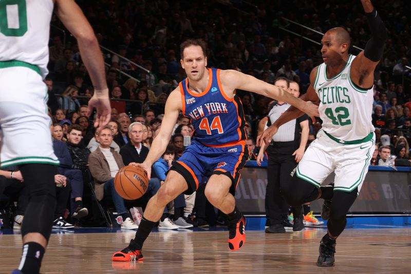NEW YORK, NY - FEBRUARY 24: Bojan Bogdanovic #44 of the New York Knicks dribbles the ball during the game against the Boston Celtics on February 24, 2024 at Madison Square Garden in New York City, New York.  NOTE TO USER: User expressly acknowledges and agrees that, by downloading and or using this photograph, User is consenting to the terms and conditions of the Getty Images License Agreement. Mandatory Copyright Notice: Copyright 2024 NBAE  (Photo by Nathaniel S. Butler/NBAE via Getty Images)
