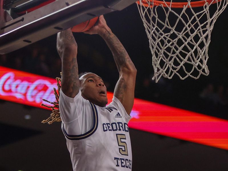 Jan 4, 2023; Atlanta, Georgia, USA; Georgia Tech Yellow Jackets guard Deivon Smith (5) dunks against the Miami Hurricanes in the second half at McCamish Pavilion. Mandatory Credit: Brett Davis-USA TODAY Sports