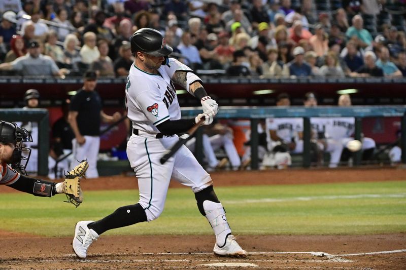 Sep 20, 2023; Phoenix, Arizona, USA;  Arizona Diamondbacks first baseman Christian Walker (53) hits a single in the third inning against the San Francisco Giants at Chase Field. Mandatory Credit: Matt Kartozian-USA TODAY Sports