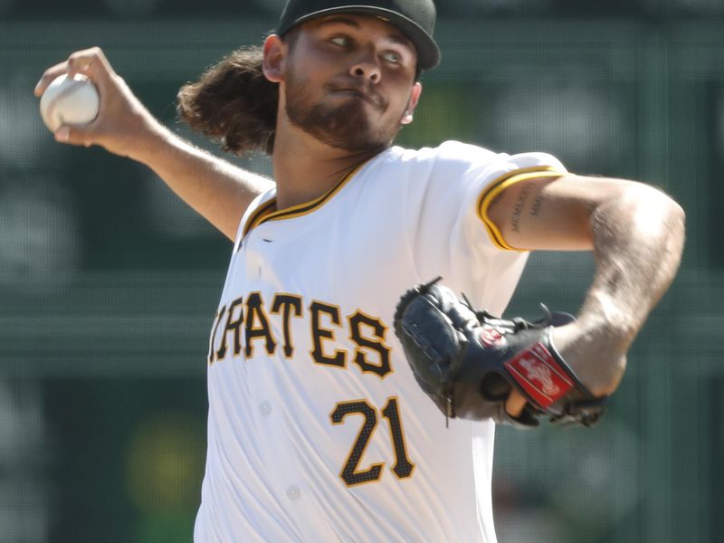 Sep 15, 2024; Pittsburgh, Pennsylvania, USA;  Pittsburgh Pirates starting pitcher Jared Jones (37) delivers a pitch against the Kansas City Royals during the first inning at PNC Park. Mandatory Credit: Charles LeClaire-Imagn Images