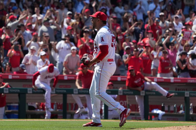 Jul 2, 2023; Anaheim, California, USA; Los Angeles Angels relief pitcher Carlos Estevez (53) celebrates at the end of the game against the Arizona Diamondbacks at Angel Stadium. Mandatory Credit: Kirby Lee-USA TODAY Sports