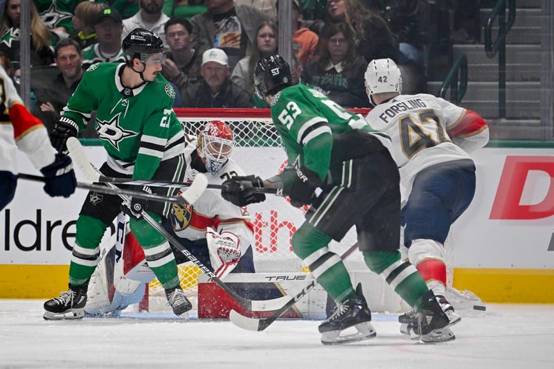 Mar 12, 2024; Dallas, Texas, USA; Dallas Stars left wing Mason Marchment (27) and center Wyatt Johnston (53) look for the puck in front of Florida Panthers goaltender Sergei Bobrovsky (72) during the third period at the American Airlines Center. Mandatory Credit: Jerome Miron-USA TODAY Sports