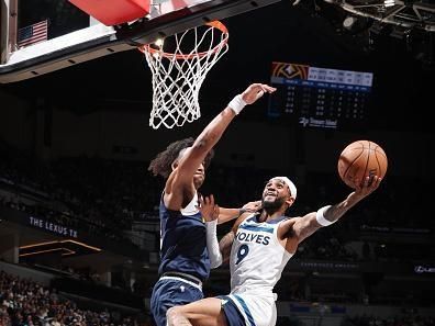 MINNEAPOLIS, MN -  NOVEMBER 1: Nickeil Alexander-Walker #9 of the Minnesota Timberwolves drives to the basket during the game against the Denver Nuggets on November 1, 2023 at Target Center in Minneapolis, Minnesota. NOTE TO USER: User expressly acknowledges and agrees that, by downloading and or using this Photograph, user is consenting to the terms and conditions of the Getty Images License Agreement. Mandatory Copyright Notice: Copyright 2023 NBAE (Photo by David Sherman/NBAE via Getty Images)