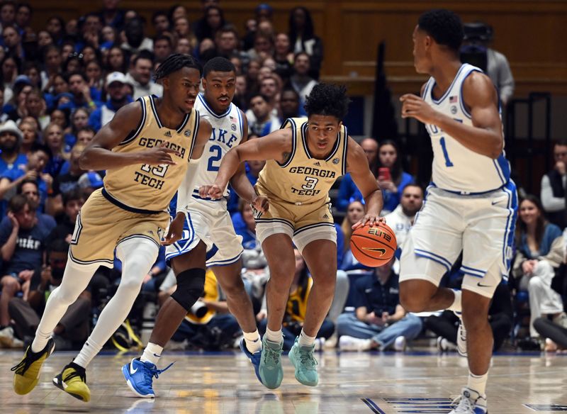 Jan 13, 2024; Durham, North Carolina, USA;  Georgia Tech Yellow Jackets guard Dallan Coleman (3) controls the ball against Blue Devils guard Jaylen Blakes (2) during the first half at Cameron Indoor Stadium. Mandatory Credit: Rob Kinnan-USA TODAY Sports