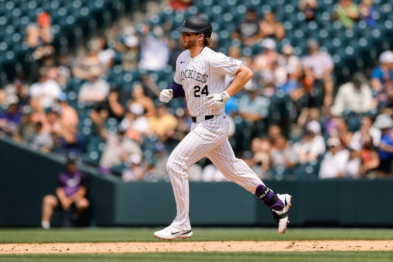 Jul 24, 2024; Denver, Colorado, USA; Colorado Rockies third baseman Ryan McMahon (24) rounds the bases on a two run home run in the fourth inning against the Boston Red Sox at Coors Field. Mandatory Credit: Isaiah J. Downing-USA TODAY Sports