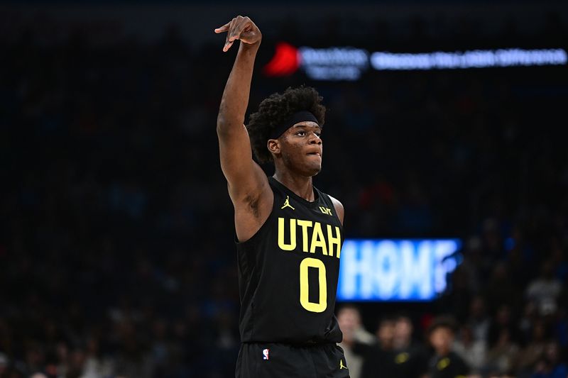 OKLAHOMA CITY, OKLAHOMA - DECEMBER 11: Jordan Hendricks #0 of the Utah Jazz gestures after a basket during the first half against the Oklahoma City Thunder at Paycom Center on December 11, 2023 in Oklahoma City, Oklahoma. NOTE TO USER: User expressly acknowledges and agrees that, by downloading and or using this Photograph, user is consenting to the terms and conditions of the Getty Images License Agreement. (Photo by Joshua Gateley/Getty Images)