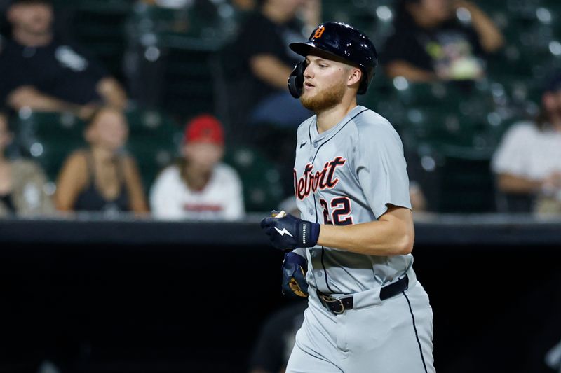 Aug 26, 2024; Chicago, Illinois, USA; Detroit Tigers outfielder Parker Meadows (22) rounds the bases after hitting a solo home run against the Chicago White Sox during the seventh inning at Guaranteed Rate Field. Mandatory Credit: Kamil Krzaczynski-USA TODAY Sports