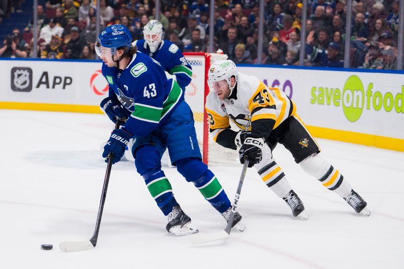 Feb 27, 2024; Vancouver, British Columbia, CAN; Pittsburgh Penguins forward Jansen Harkins (43) skates after Vancouver Canucks defenseman Quinn Hughes (43) in the third period at Rogers Arena. Penguins won 4-3 in overtime. Mandatory Credit: Bob Frid-USA TODAY Sports