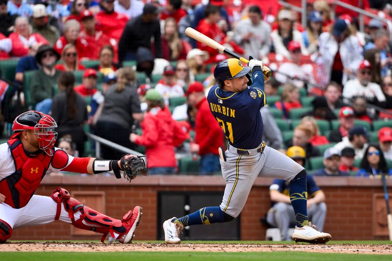 Apr 27, 2025; St. Louis, Missouri, USA;  Milwaukee Brewers third baseman Caleb Durbin (21) hits a one run single against the St. Louis Cardinals during the fourth inning at Busch Stadium. Mandatory Credit: Jeff Curry-Imagn Images