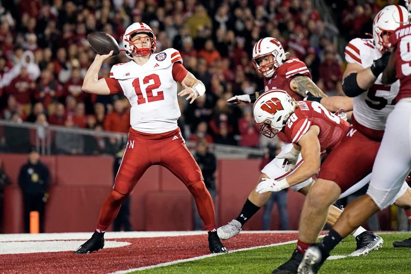 Nov 18, 2023; Madison, Wisconsin, USA;  Nebraska Cornhuskers quarterback Chubba Purdy (12) throws a pass during the first quarter against the Wisconsin Badgers at Camp Randall Stadium. Mandatory Credit: Jeff Hanisch-USA TODAY Sports