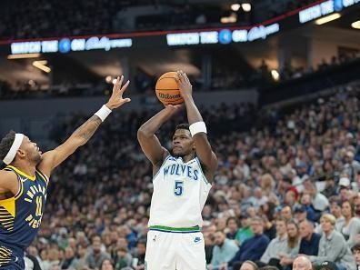 MINNEAPOLIS, MN -  DECEMBER 16: Anthony Edwards #5 of the Minnesota Timberwolves three point basket during the game against the Indiana Pacers on December 16, 2023 at Target Center in Minneapolis, Minnesota. NOTE TO USER: User expressly acknowledges and agrees that, by downloading and or using this Photograph, user is consenting to the terms and conditions of the Getty Images License Agreement. Mandatory Copyright Notice: Copyright 2023 NBAE (Photo by Jordan Johnson/NBAE via Getty Images)