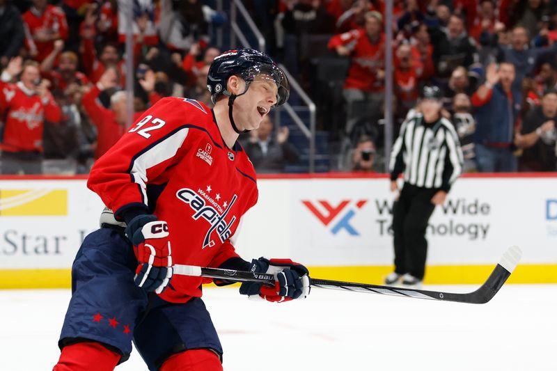 Oct 16, 2023; Washington, District of Columbia, USA; Washington Capitals center Evgeny Kuznetsov (92) reacts after scoring a shootout goal against the Calgary Flames at Capital One Arena. Mandatory Credit: Geoff Burke-USA TODAY Sports