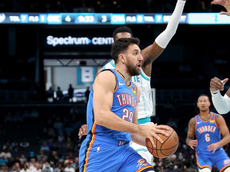 CHARLOTTE, NC - OCTOBER 15: Vasilije Micic #0 of the Oklahoma City Thunder drives to the basket during the game against the Charlotte Hornets on October 15, 2023 at Spectrum Center in Charlotte, North Carolina. NOTE TO USER: User expressly acknowledges and agrees that, by downloading and or using this photograph, User is consenting to the terms and conditions of the Getty Images License Agreement.  Mandatory Copyright Notice:  Copyright 2023 NBAE (Photo by Brock Williams-Smith/NBAE via Getty Images)