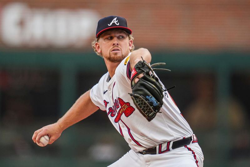 May 29, 2024; Cumberland, Georgia, USA; Atlanta Braves starting pitcher Spencer Schwellenbach (56) pitches against the Washington Nationals during the first inning at Truist Park. Mandatory Credit: Dale Zanine-USA TODAY Sports