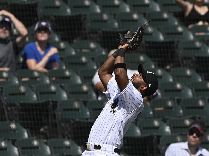 Aug 23, 2023; Chicago, Illinois, USA;  Chicago White Sox third baseman  Elvis Andrus (1) catches a pop up hit by Seattle Mariners center fielder Julio Rodriguez (44) during the fifth inning at Guaranteed Rate Field. Mandatory Credit: Matt Marton-USA TODAY Sports