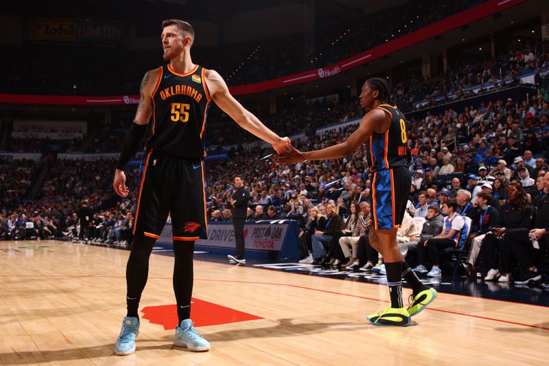 OKLAHOMA CITY, OK - JANUARY 5: Isaiah Hartenstein #55 and Jalen Williams #8 of the Oklahoma City Thunder high five during the game against the Boston Celtics on January 5, 2025 at Paycom Center in Oklahoma City, Oklahoma. NOTE TO USER: User expressly acknowledges and agrees that, by downloading and or using this photograph, User is consenting to the terms and conditions of the Getty Images License Agreement. Mandatory Copyright Notice: Copyright 2025 NBAE (Photo by Zach Beeker/NBAE via Getty Images)