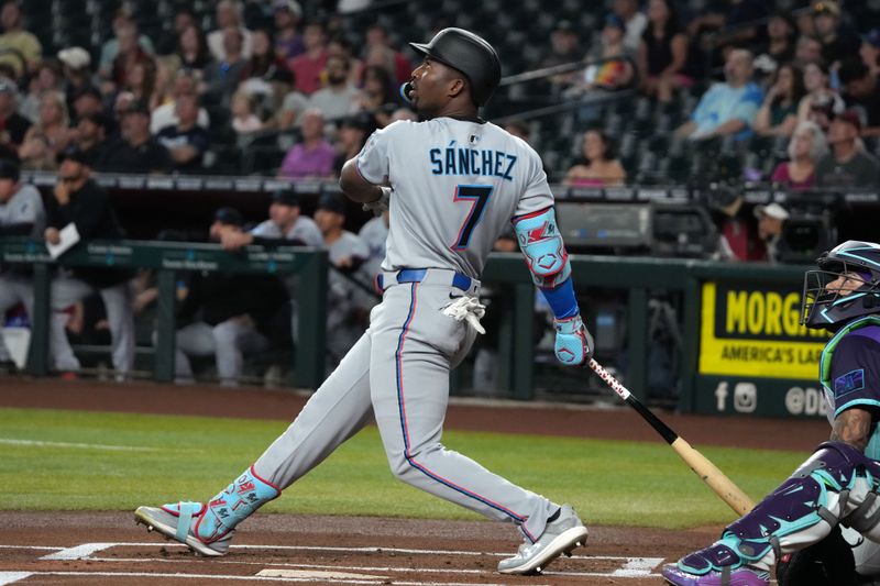 Jun 27, 2025; Phoenix, Arizona, USA; Miami Marlins outfielder Jesús Sánchez (7) during an at bat against the Arizona Diamondbacks in the first inning at Chase Field. Mandatory Credit: Rick Scuteri-Imagn Images