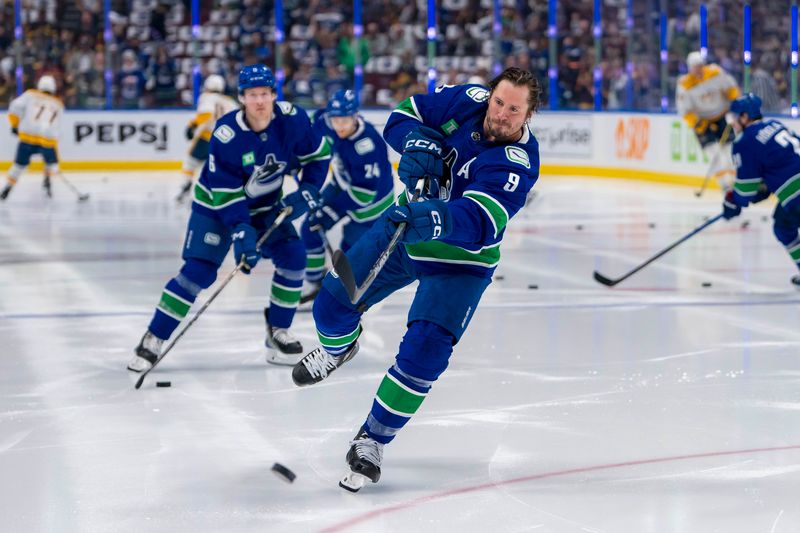 Apr 23, 2024; Vancouver, British Columbia, CAN;  Vancouver Canucks forward J.T. Miller (9) shoots in warm up prior to game two of the first round of the 2024 Stanley Cup Playoffs against the Nashville Predators at Rogers Arena. Mandatory Credit: Bob Frid-USA TODAY Sports