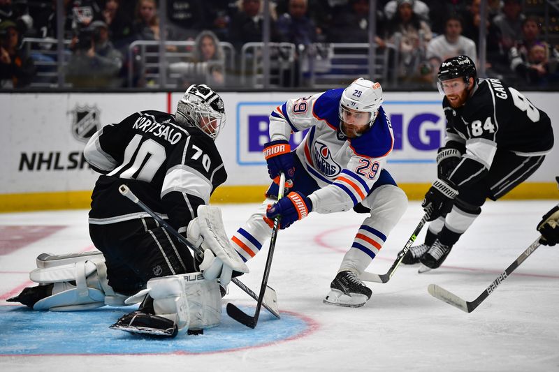 Apr 29, 2023; Los Angeles, California, USA; Edmonton Oilers center Leon Draisaitl (29) moves in for a shot against Los Angeles Kings goaltender Joonas Korpisalo (70) during the third period in game six of the first round of the 2023 Stanley Cup Playoffs at Crypto.com Arena. Mandatory Credit: Gary A. Vasquez-USA TODAY Sports